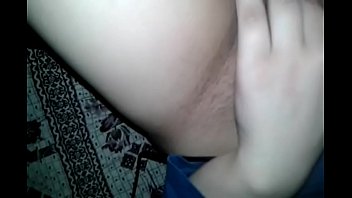 A guy films a Georgian woman fondling her pussy with her fingers